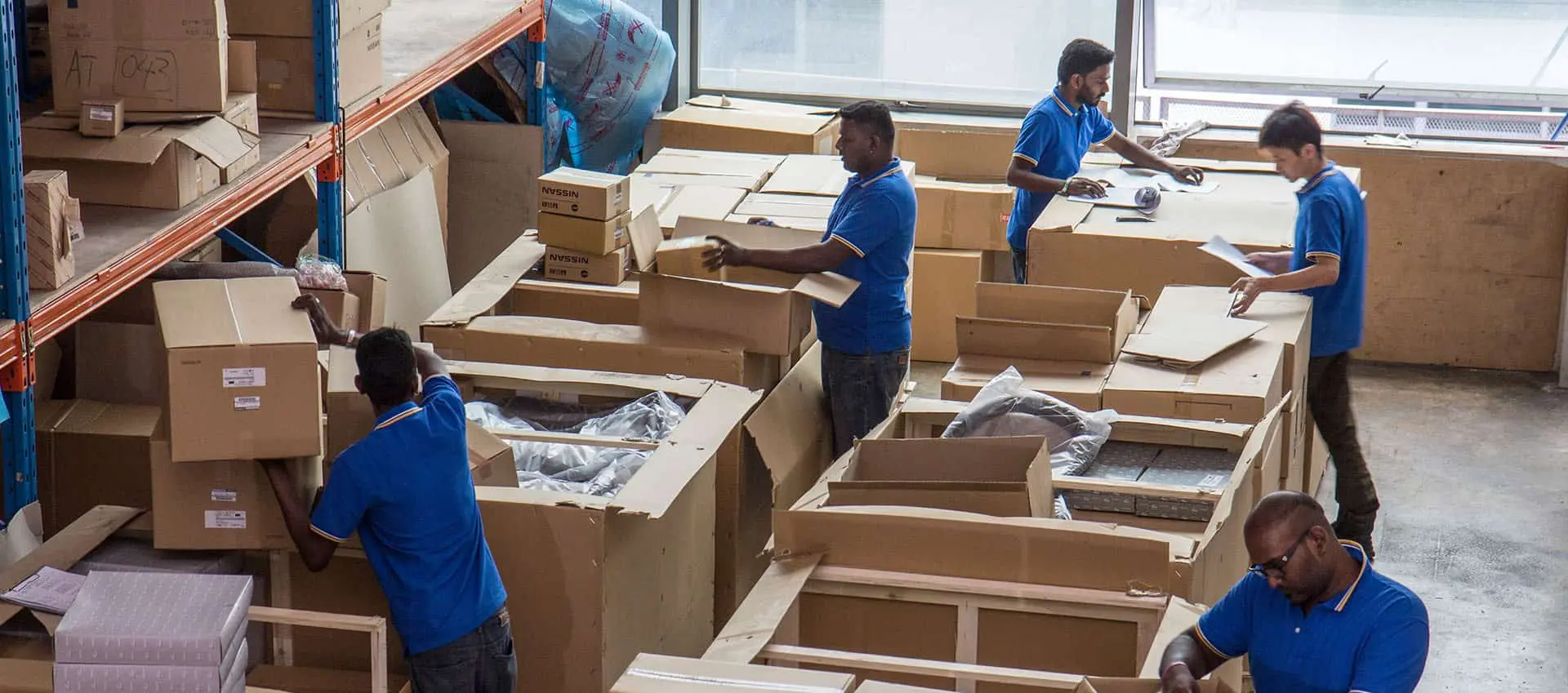 Alltrade warehouse team handling genuine parts